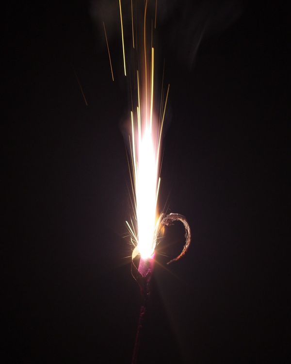 A sparkler at night
